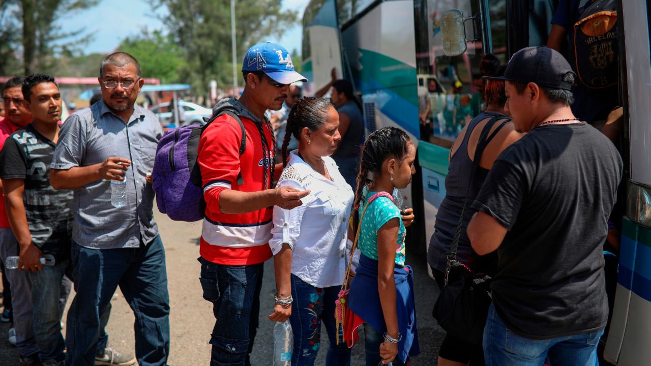 Central American migrants traveling with the annual "Stations of the Cross" caravan board a bus that will take them to Mexico City, at the sports club where they had been camping out in Matias Romero, Oaxaca State, Mexico, Thursday, April 5, 2018. Migrants in the caravan that drew criticism from U.S. President Donald Trump began packing up their meager possessions and boarding buses to the Mexican capital and the nearby city of Puebla. (AP Photo/Felix Marquez)