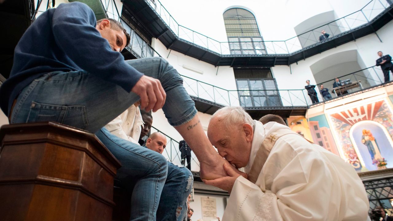 Seeing Francis wash the feet of inmates on Holy Thursday can compel people into acts of kindness, scholars say.