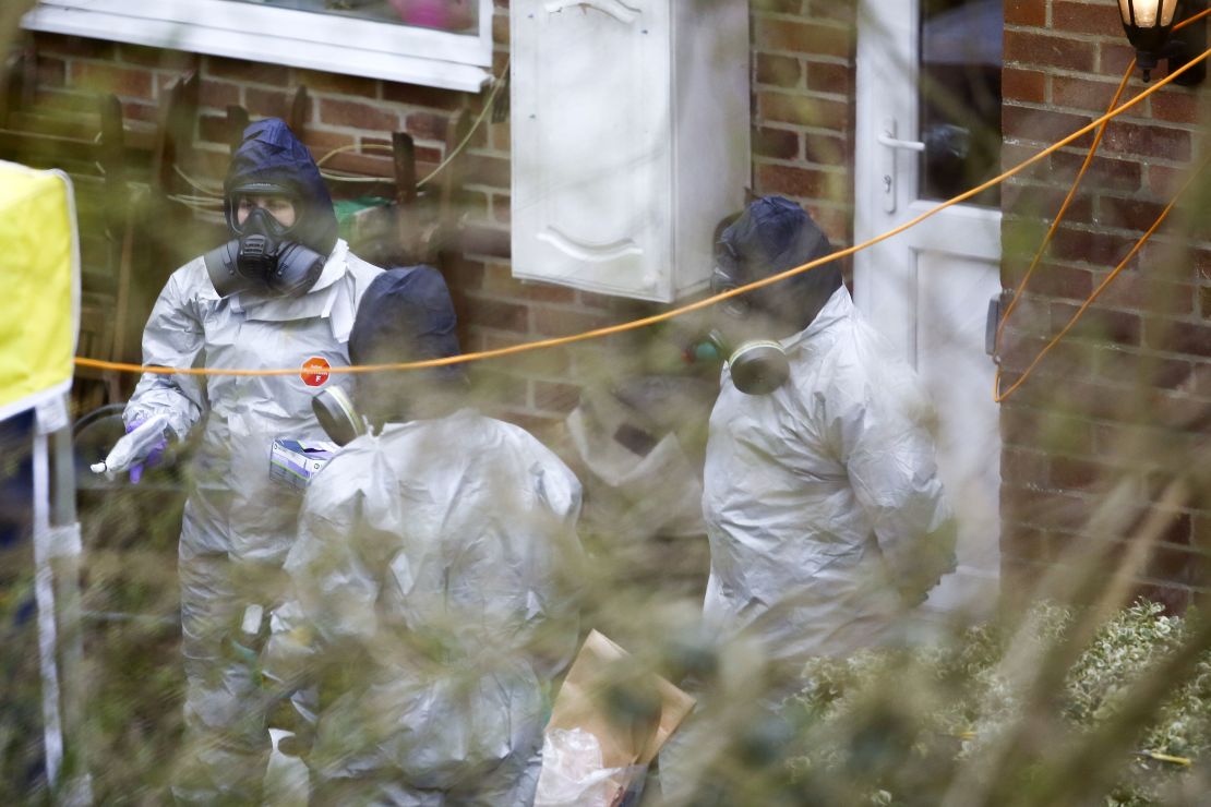 Investigators work in the garden of Sergei Skripal's house on March 22.