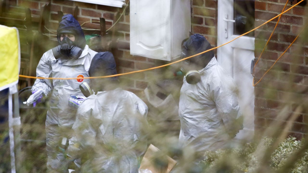 Investigators work in the garden of Sergei Skripal's house in Salisbury on March 22.