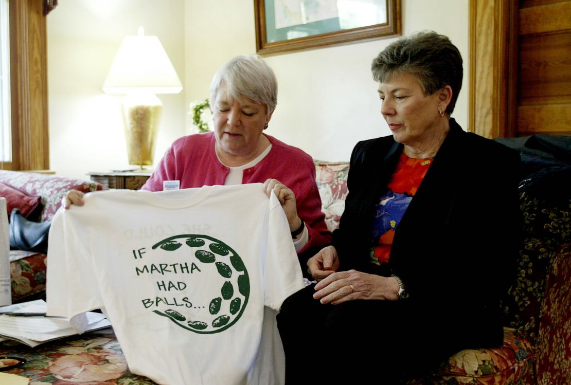 Martha Burke (right), chairwoman of the National Council of Women's Organizations, discusses an anti-Burke shirt with Heidi Hartman, vice-chairwoman of the National Council of Women's Organizations, during Masters week in 2003.