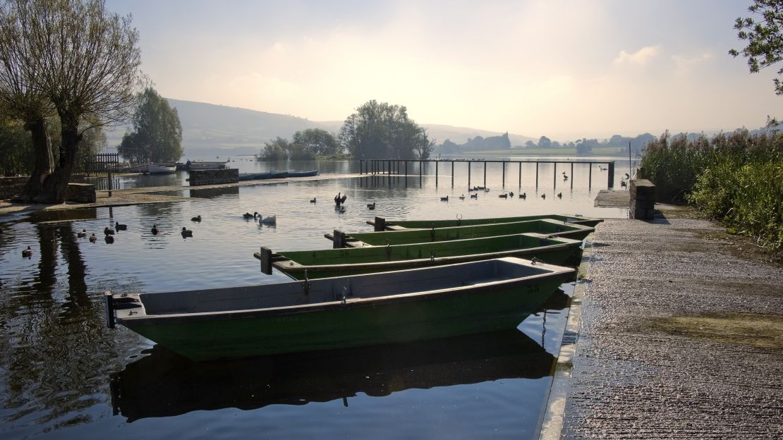 Picturesque Llangorse Lake lies in the Brecon Beacons National Park.