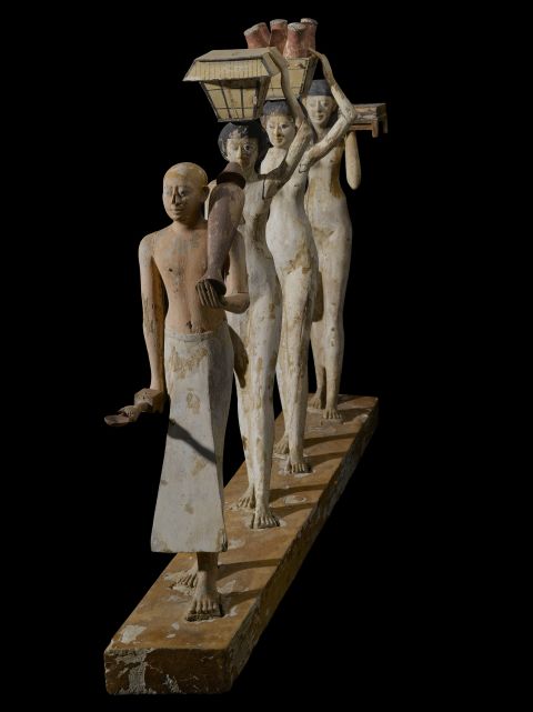 The best known of the models found within the tomb are the exquisitely carved "Bersha procession" of a male priest leading female offering bearers.