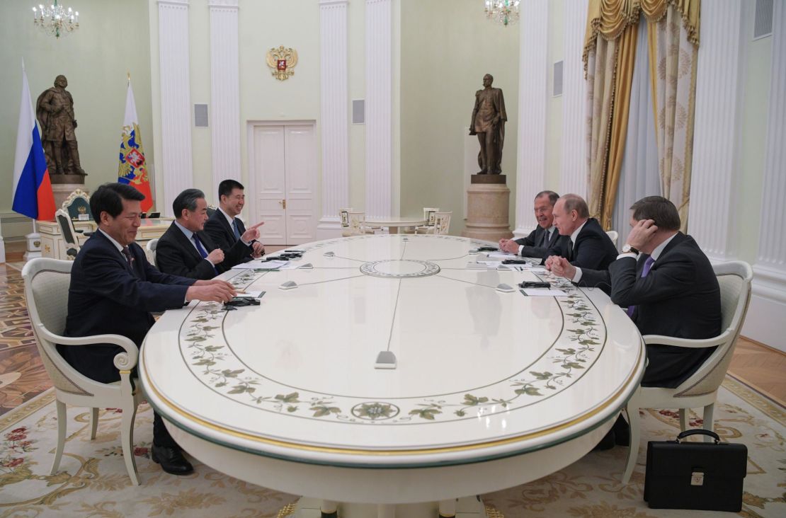 Russian President Vladimir Putin meets with Chinese Foreign Minister Wang Yi at the Kremlin in Moscow on April 5.