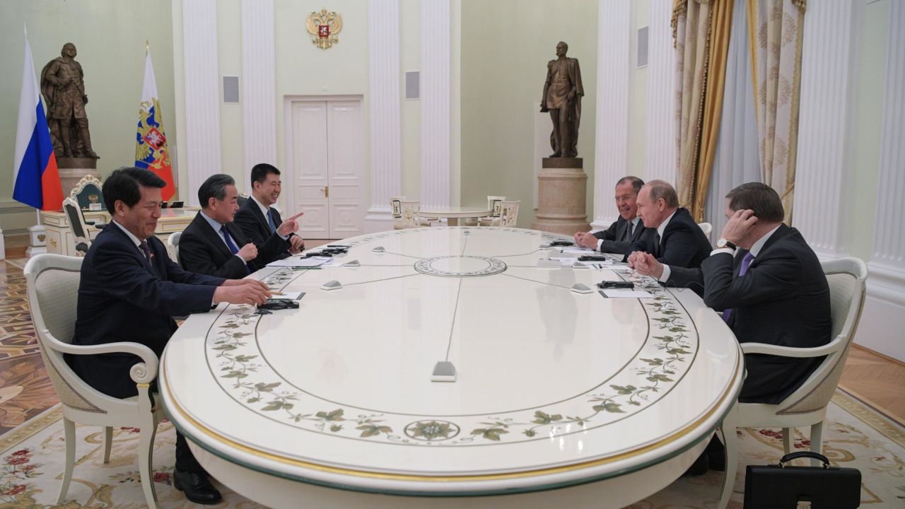 Russian President Vladimir Putin meets with Chinese Foreign Minister Wang Yi at the Kremlin in Moscow on April 5.