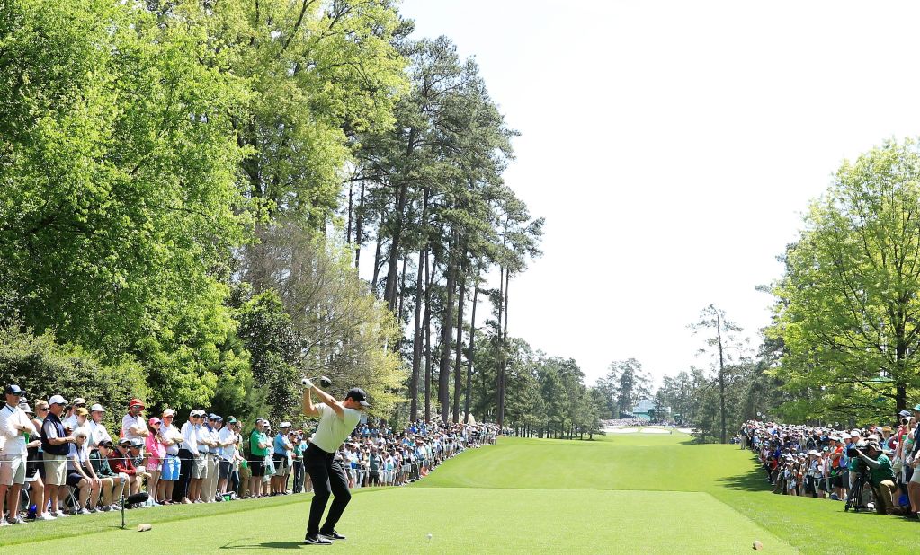 Rory McIlroy hits a tee shot on the seventh hole Friday. He went into the weekend in good shape (4-under for the tournament, five strokes off the lead).