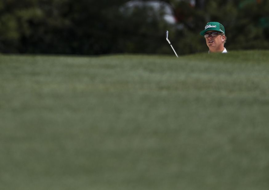 Charley Hoffman looks at a bunker shot on the first hole Friday.