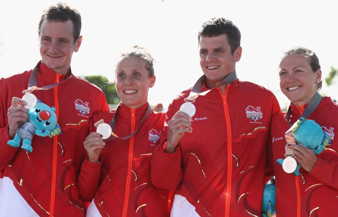 England's Alistair Brownlee, Jess Learmonth, Jonny Brownlee and Vicky Holland display their medals. 