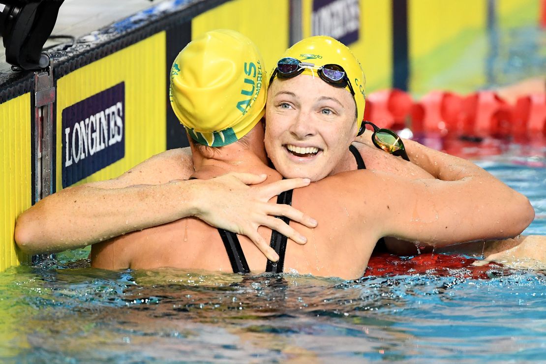Cate Campbell of Australia (R) celebrates her victory in the women's 50m Freestyle Final with teammate Bronte Campbell.