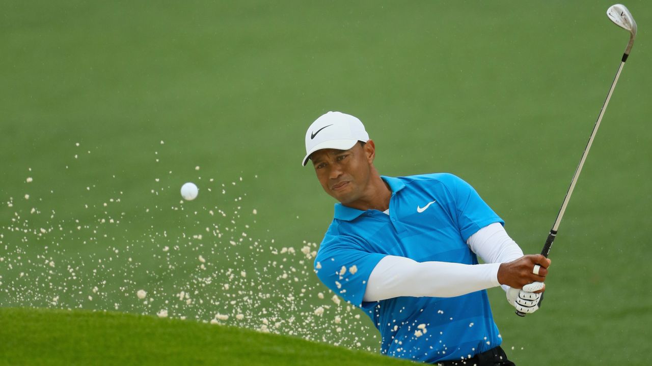 Tiger Woods plays a shot from a bunker on the second hole during the third round of the 2018 Masters Tournament on Saturday, April 7, in Augusta, Georgia.  