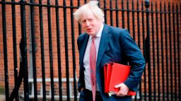 Britain's Foreign Secretary Boris Johnson leaves 10 Downing Street in central London on March 27 after attending the weekly meeting of the Cabinet. / AFP PHOTO / Tolga AKMEN        (Photo credit should read TOLGA AKMEN/AFP/Getty Images)