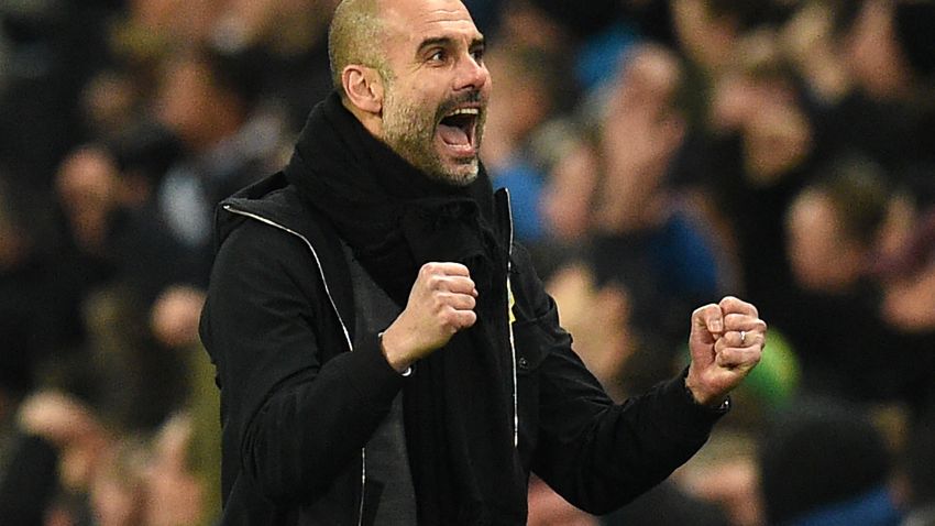 Manchester City's Spanish manager Pep Guardiola celebrates their first goal during the English Premier League football match between Manchester City and Newcastle United.