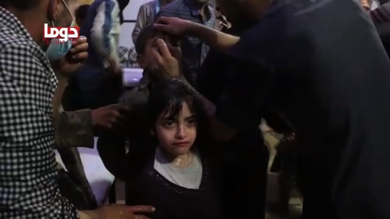 A frame from an activist's video purportedly shows children being treated for symptoms of a chemical attack.