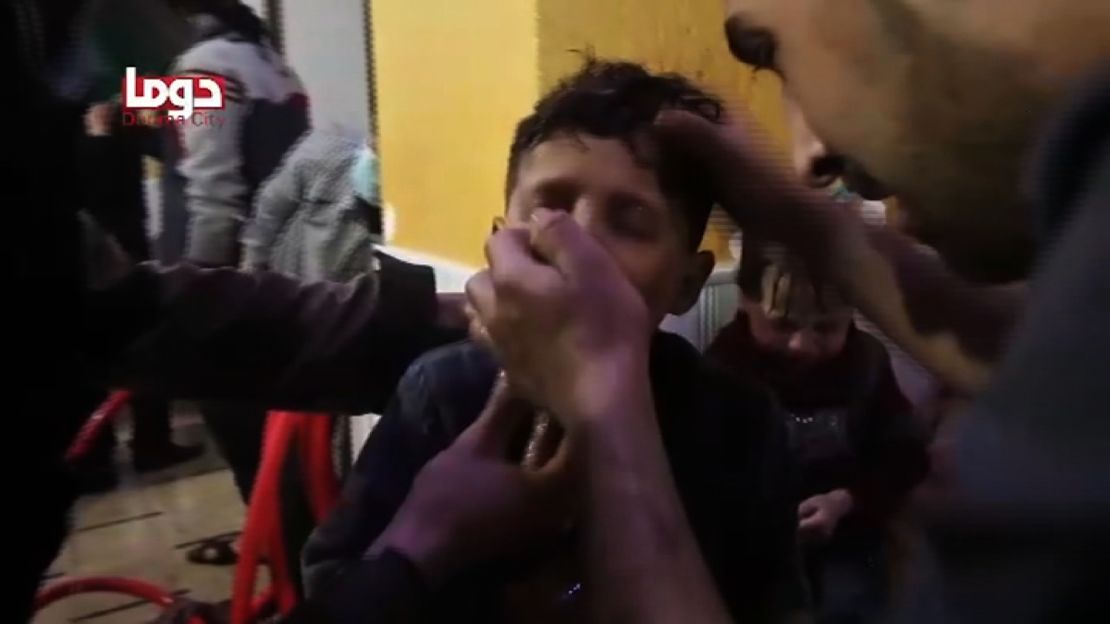 A screengrab from an activist video shows a child being treated by emergency responders.