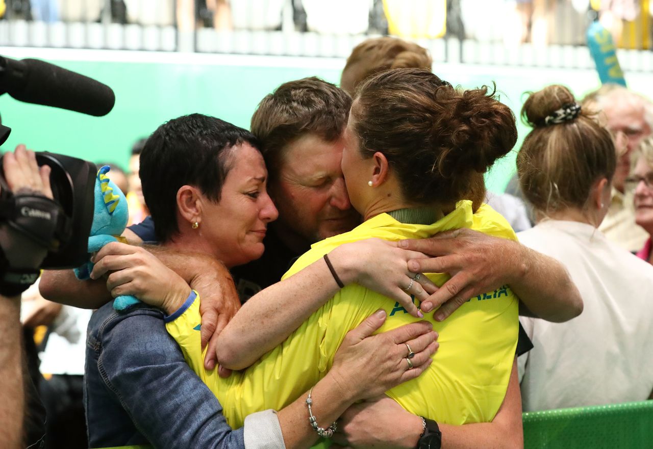 Toomey embraces her family following her win. "I made the decision not to see family prior to the Games so I'm solely focused on the Games," she told CNN Sport. "As soon as I saw my uncle and auntie, mum and dad, the emotions just hit hard after I got off the dice."