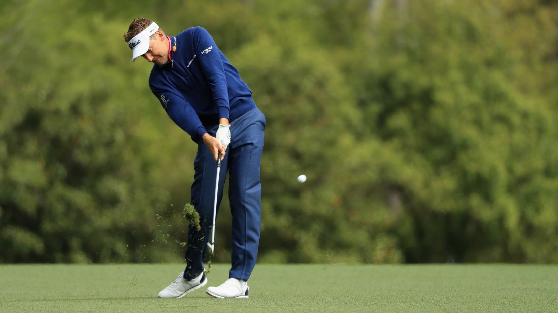 Ian Poulter plays a shot on the fifth hole on Sunday. 