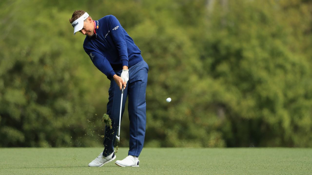 Ian Poulter plays a shot on the fifth hole on Sunday. 