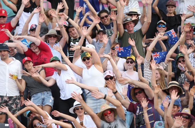 Crowds enjoy the atmosphere during the beach volleyball women's match between Australia and Cyprus.