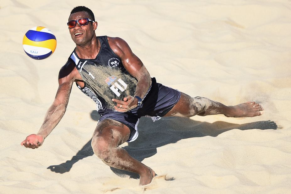 Inia Korowale of Fiji dives to save the point during the beach volleyball men's preliminary round.