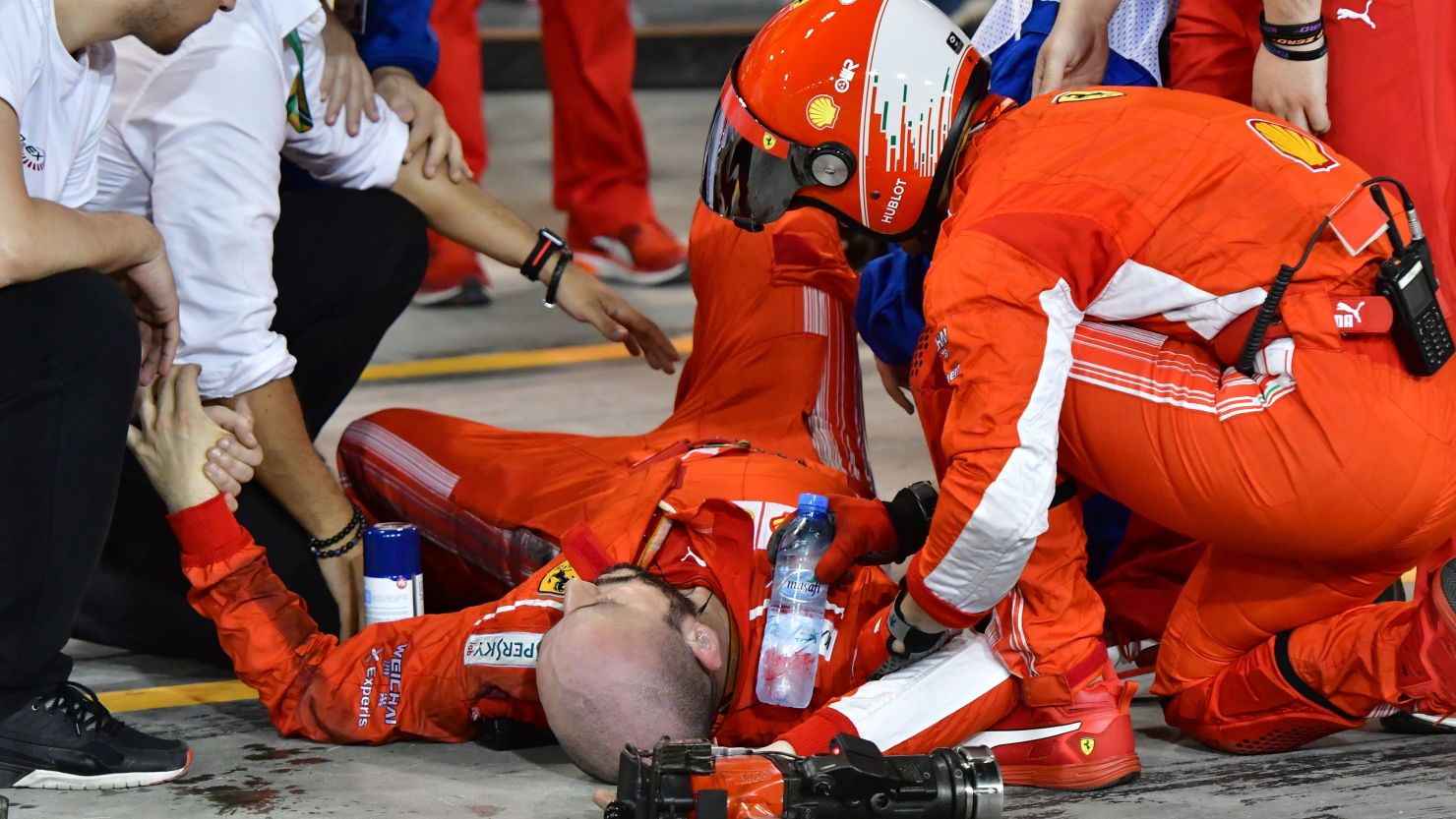 The Ferrari mechanic suffered a fractured shinbone and fibula.
