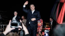 Viktor Orban, Hungary's prime minister, waves while arriving at the Fidesz party headquarters following results for the parliamentary elections in Budapest, Hungary, on Sunday, April 8, 2018. 