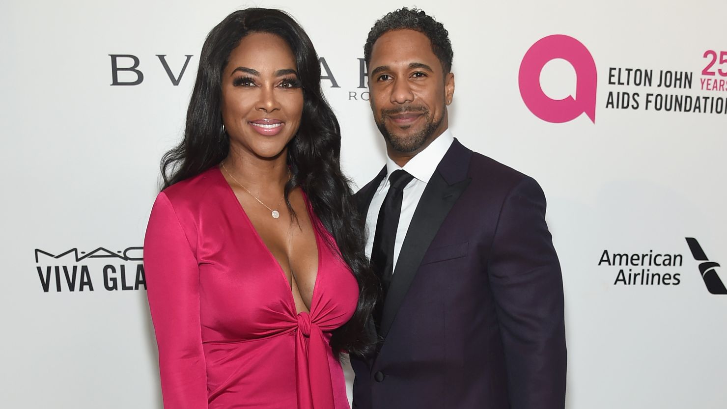 Kenya Moore, left, and Marc Daly attend the 26th annual Elton John AIDS Foundation's Academy Awards Viewing Party in West Hollywood on March 4, 2018.