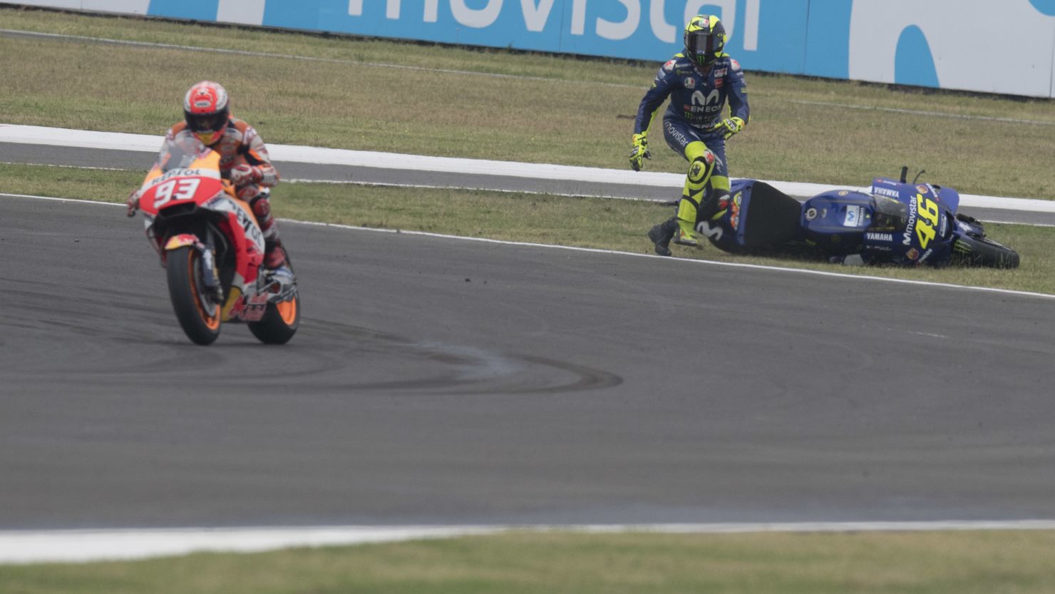 Valentino Rossi reacts furiously as Marc Marquez drives off following on-track collision.