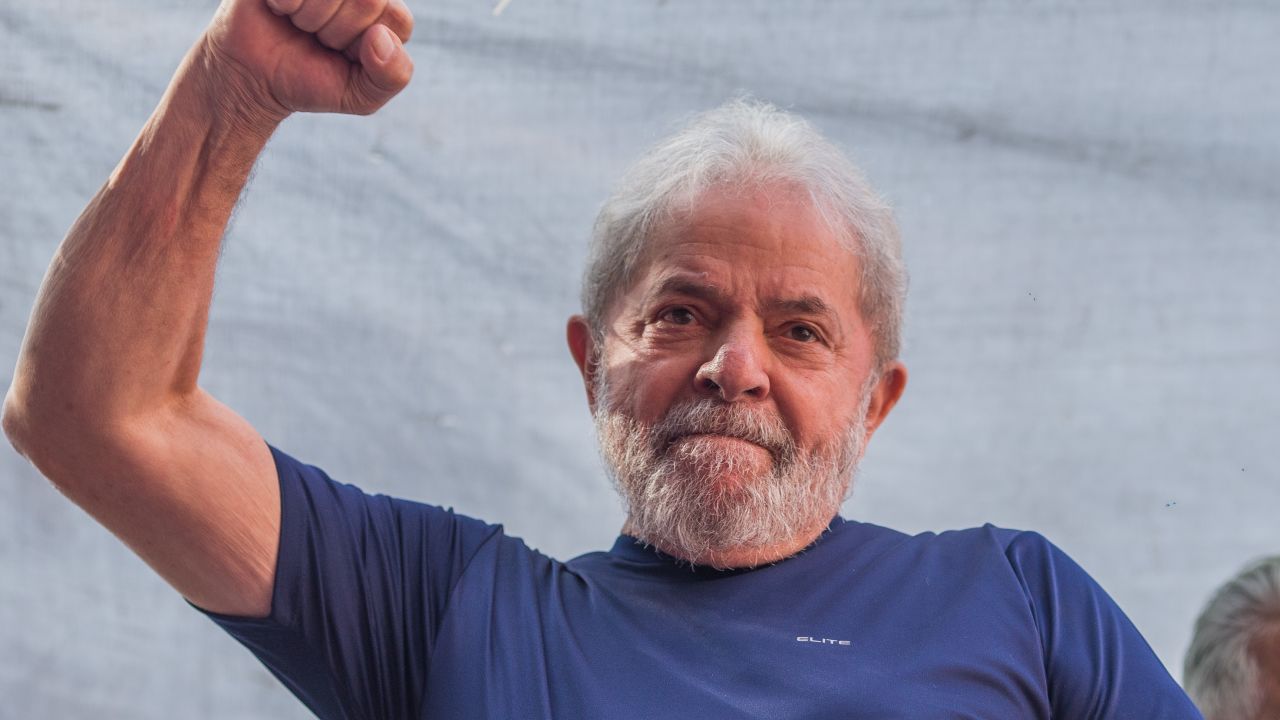 Former President Luiz Inacio Lula da Silva gestures to supporters at the headquarters of the Metalworkers' Union in April before his surrender to federal police.