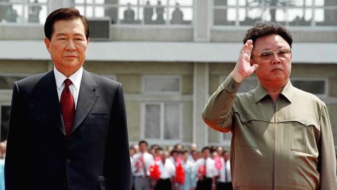 The late leaders of North and South Korea, Kim Jong Il, right, and Kim Dae-jung, left, meet to reconcile political differences as Kim Dae-jung arrives in June 2000 at the Sunan International Airport in Pyongyang, North Korea.