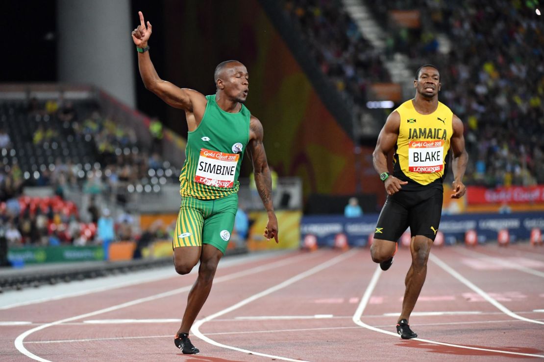 South Africa's Akani Simbine crosses the finish line to claim victory in the men's 100m final at the Commonwealth Games.