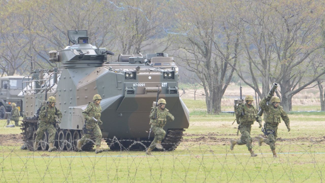 Japan's new amphibious rapid deployment brigade training on Saturday, April 7.