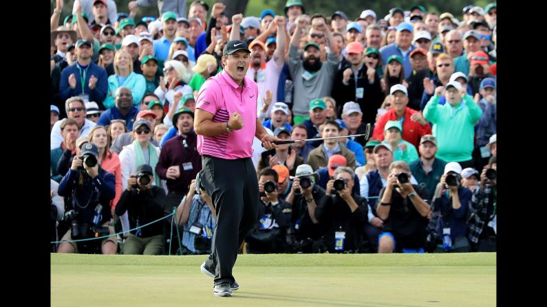 Patrick Reed celebrates after his par putt <a  target="_blank">clinched the Masters title</a> on Sunday, April 8. It is the first major victory for Reed, who finished a stroke ahead of Rickie Fowler.