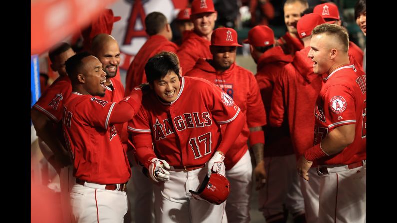 Shohei Ohtani is congratulated by his Los Angeles Angels teammates after hitting his first Major League home run on Tuesday, April 3. In his first 10 games, <a target="_blank" target="_blank">the Japanese phenom</a> has hit three home runs -- and won two games as a pitcher.