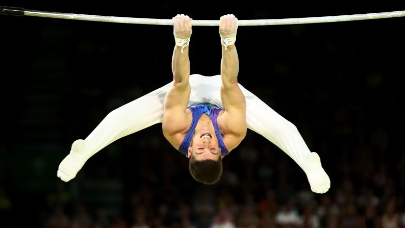 Scottish gymnast Frank Baines competes on the horizontal bar during the Commonwealth Games on Monday, April 9.