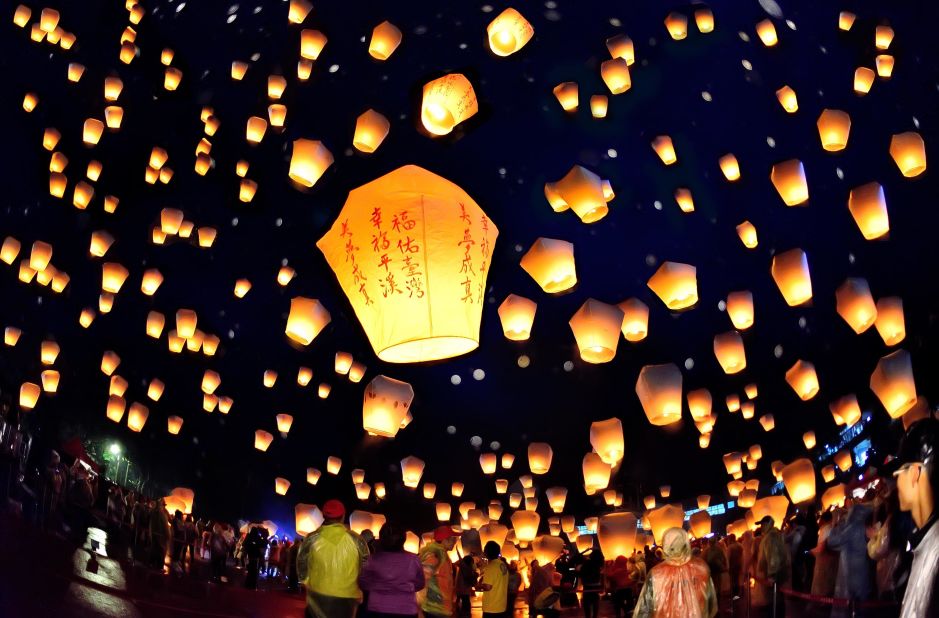 <strong>Pingxi Lantern Festival: </strong> Every year, thousands flock to the Taiwan village of Pingxi for the Lantern Festival. Visitors write their wishes on paper lanterns and release them into the sky in the hopes that their ancestors will answer their prayers. 