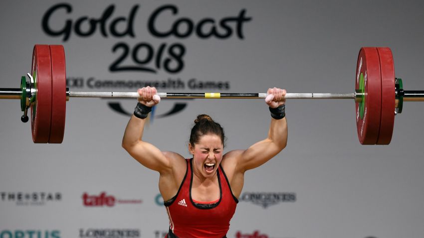 Maude Charron of Canada celebrates winning the gold medal in the women's 63kg weightlifting event at the 2018 Gold Coast Commonwealth Games at the Carrara Sports Arena on the Gold Coast on April 7, 2018.  / AFP PHOTO / WILLIAM WEST        (Photo credit should read WILLIAM WEST/AFP/Getty Images)