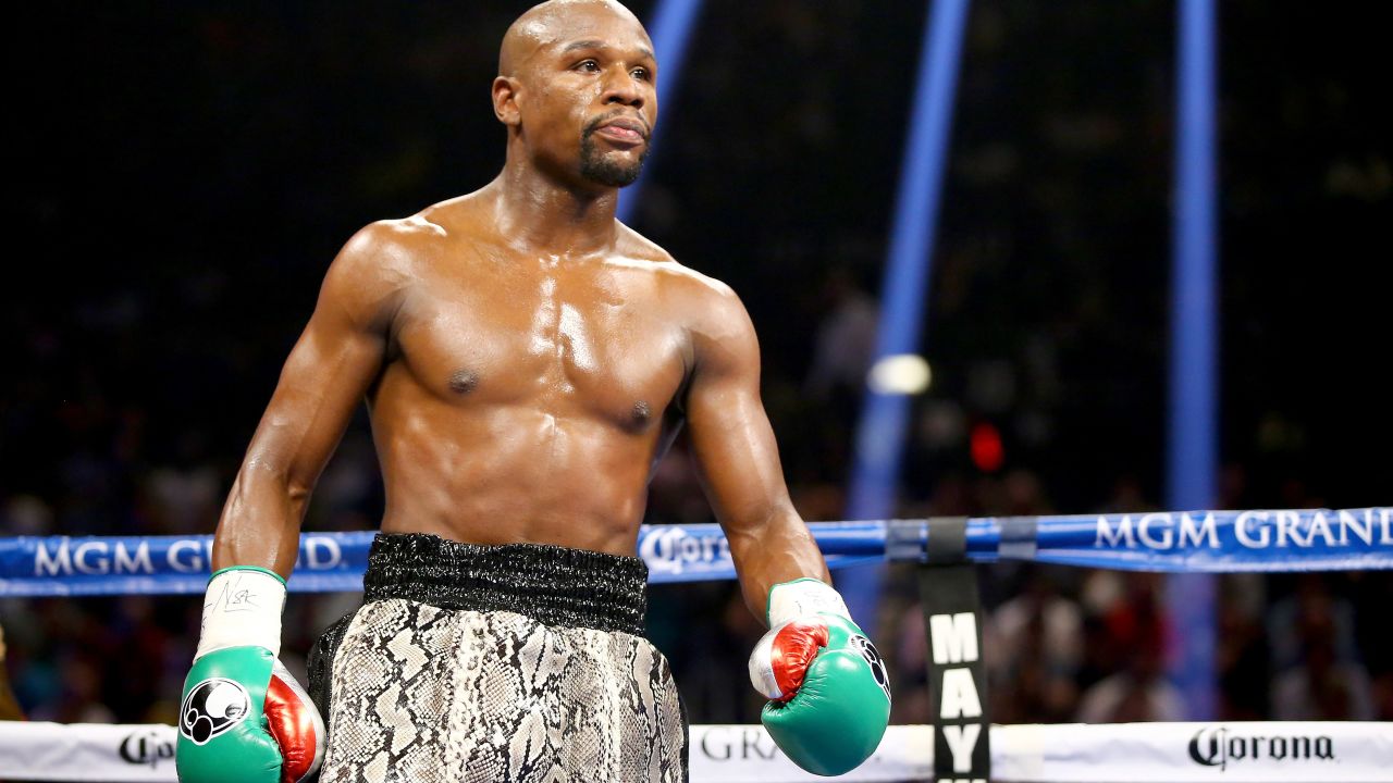 LAS VEGAS, NV - SEPTEMBER 13: Floyd Mayweather Jr. looks on while taking on Marcos Maidana during their WBC/WBA welterweight title fight at the MGM Grand Garden Arena on September 13, 2014 in Las Vegas, Nevada. (Photo by Al Bello/Getty Images)