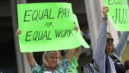 FORT LAUDERDALE, FL - MARCH 14:  Kathleen Van Schalkwyk (L) joins with other protesters to ask that woman be given the chance to have equal pay as their male co-workers on March 14, 2017 in Fort Lauderdale, Florida. The protest was held as the legislation in the state of Florida looks at passing the Helen Gordon Davis fair pay protection act that would strengthen state laws in terms of equal pay.  (Photo by Joe Raedle/Getty Images)