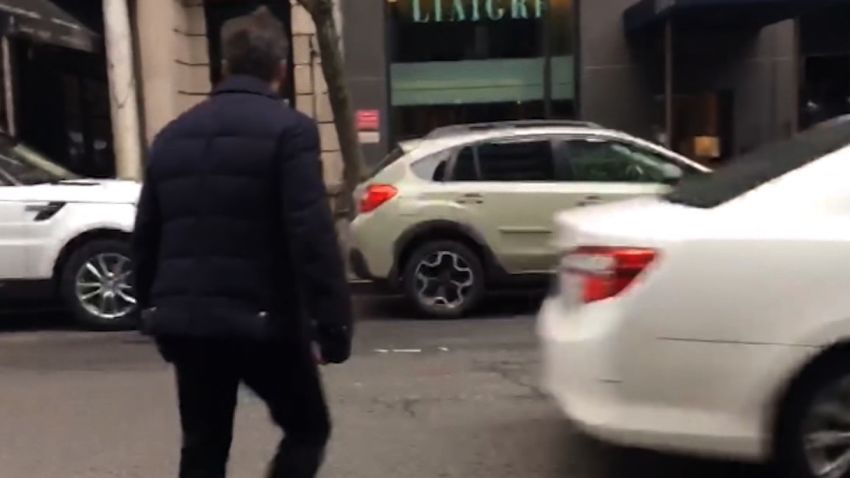 CNN has cell phone video of President Donald Trump's lawyer Michael Cohen exiting a side door connected to the Loews Regency Hotel in New York City Tuesday morning shortly after 9am. He does not speak or stop. He exited a side door of the hotel on 61st between Park and Madison which could be seen this morning being used to load and unload food and beverage items.