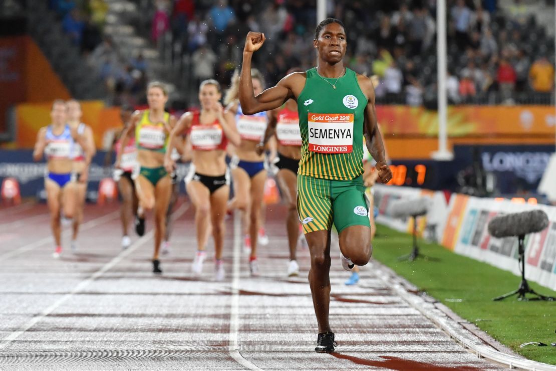 Semenya celebrates as she crosses the finish line almost three seconds ahead of her opponents in the Carrara Stadium, Gold Coast in the 1500m final.