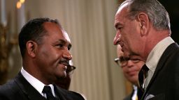 Civil Rights activist Clarence Mitchell (1911 - 1984) speaks with President Lyndon B Johnson (1908 - 1973) at the signing of the Civil Rights Act of 1968 (or the Fair Housing Act) in the East Room of the White House, Washington DC, April 11, 1968. (Photo by Frank Wolfe/Interim Archives/Getty Images)