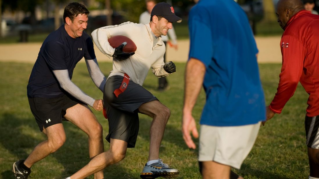 Ryan tries to evade Rep. Duncan Hunter during a flag football practice in 2009 on the National Mall in Washington. Members of Congress soon would square off against members of the Capitol Police.