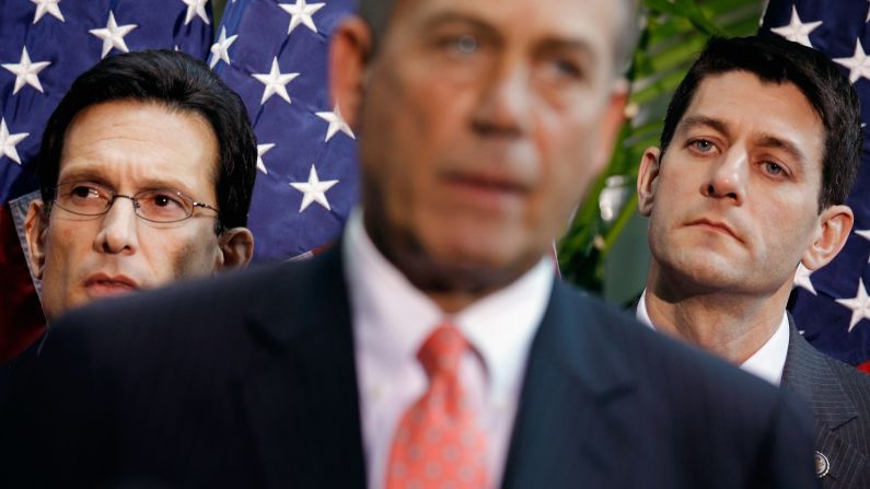 House Majority Leader Eric Cantor and Ryan listen in 2012 as House Speaker John Boehner speaks during a news conference.