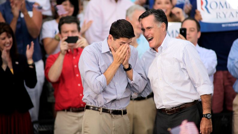 Ryan wipes away tears as he and Romney greet supporters during a 2012 campaign event in Waukesha, Wisconsin.