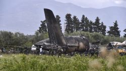 TOPSHOT - Rescuers are seen around the wreckage of an Algerian army plane which crashed near the Boufarik airbase from where the plane had taken off on April 11, 2018.
The Algerian military plane crashed and caught fire killing 257 people, mostly army personnel and members of their families, officials said. / AFP PHOTO / Ryad KRAMDI        (Photo credit should read RYAD KRAMDI/AFP/Getty Images)