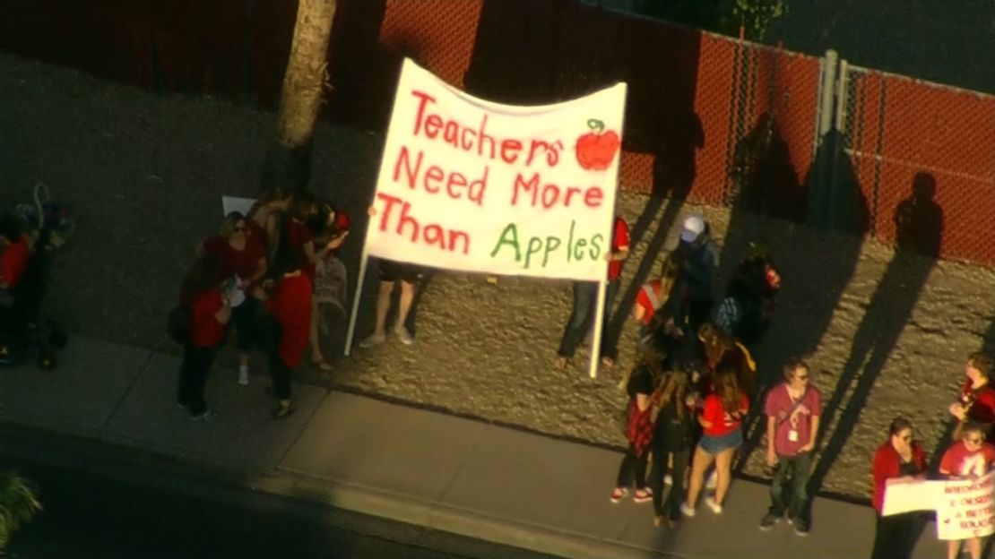 Educators and supporters gather Wednesday outside Ironwood High in Glendale, Arizona.