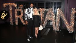 Tristan Thompson and Khloe Kardashian pose for a photo as Remy Martin celebrates Tristan Thompson's Birthday at Beauty & Essex on March 10, 2018 in Los Angeles, California. 