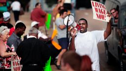 Antonio Cathey leads a crowd of fast food workers in a Fight for $15 protest in Memphis. The campaign has raised wages for low income workers but inspired a fierce counterattack by some lawmakers.