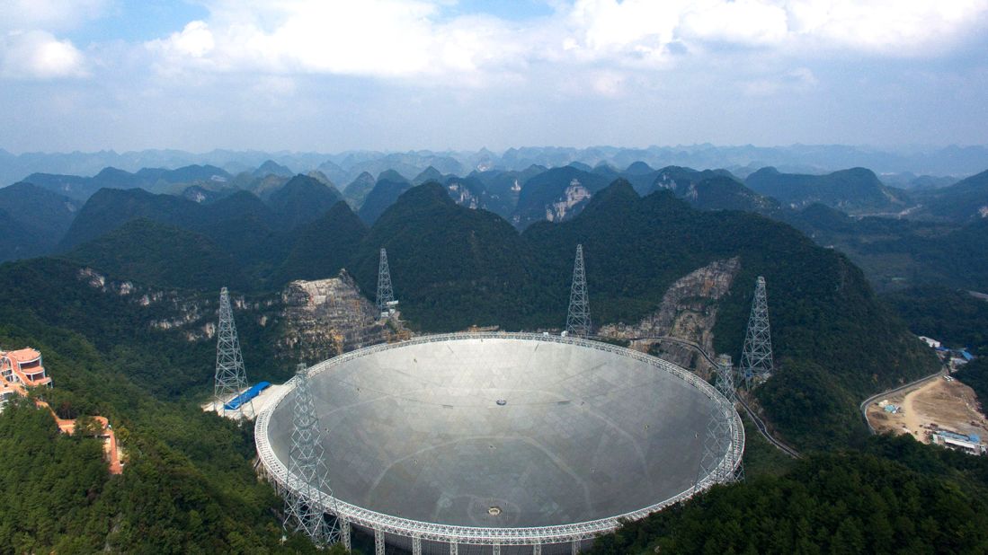 <strong>First place on Earth to contact aliens?</strong>: With a diameter of 500 meters -- the size of 30 US football fields -- China's Five-hundred-meter Aperture Spherical Radio Telescope (FAST), is the world's largest single-dish radio telescope.  The surrounding mountains provide a shield against radio frequency interference.