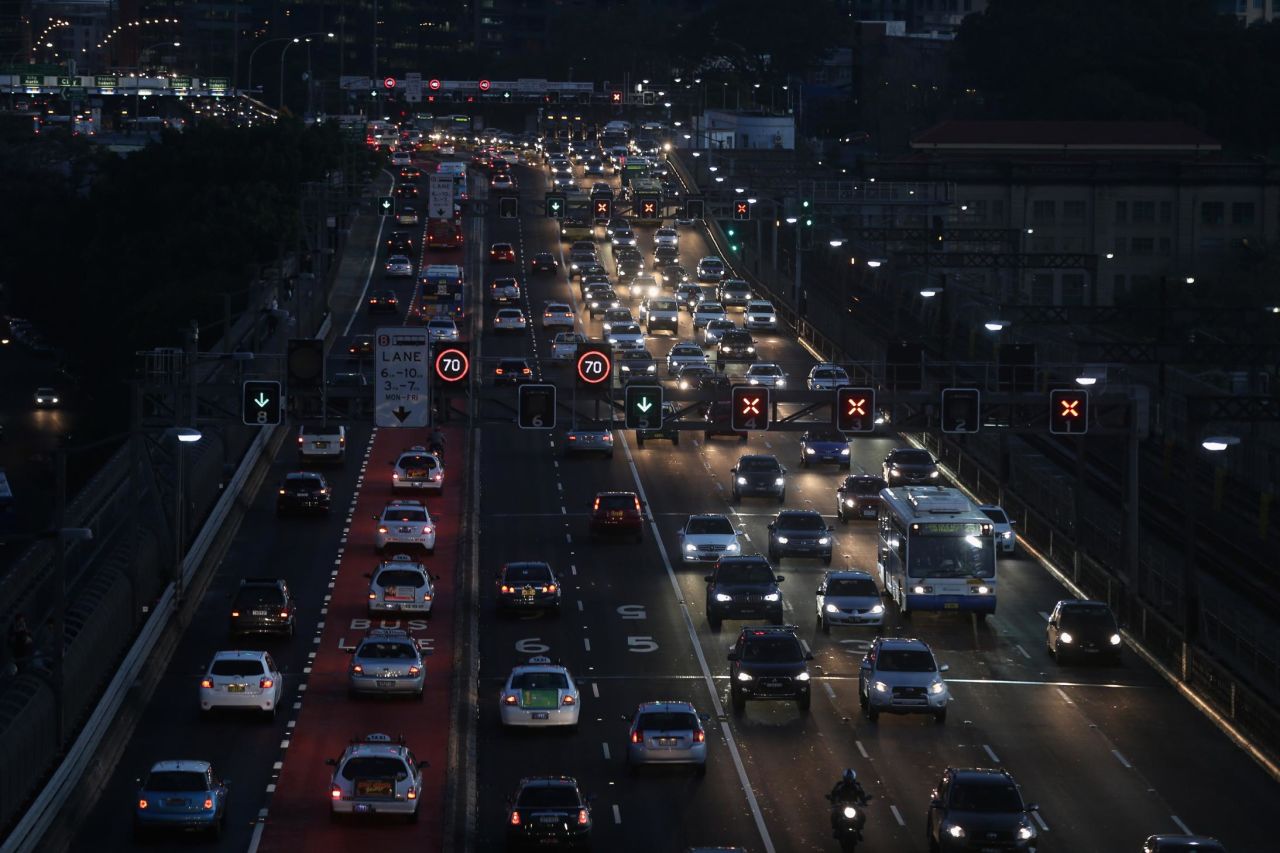The split aims to address problems such as a population explosion, sky-high housing prices, overcrowded schools, long commutes and a lack of infrastructure. Traffic towards Sydney Harbour Bridge is pictured.